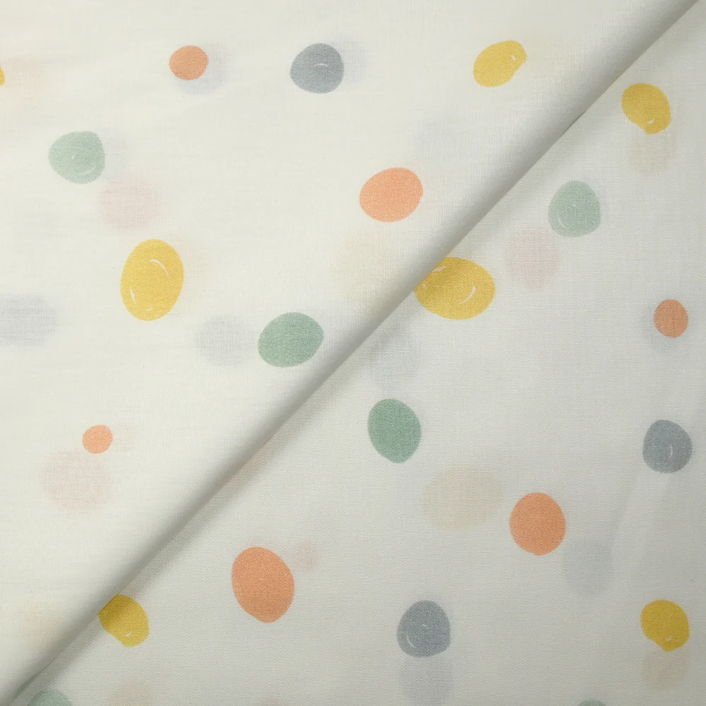 Coton imprimé à pois dessinés pastel fond blanc