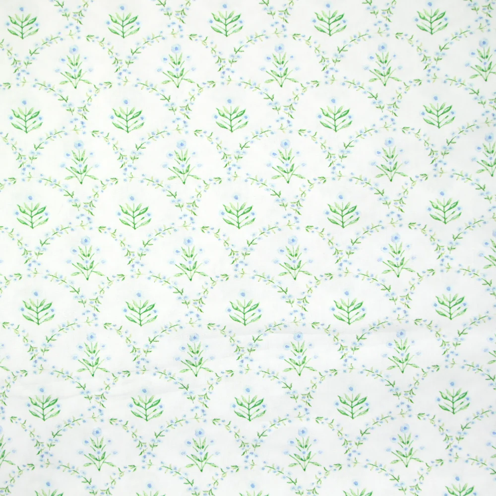 Coton imprimé arc de fleurs vert fond blanc cassé