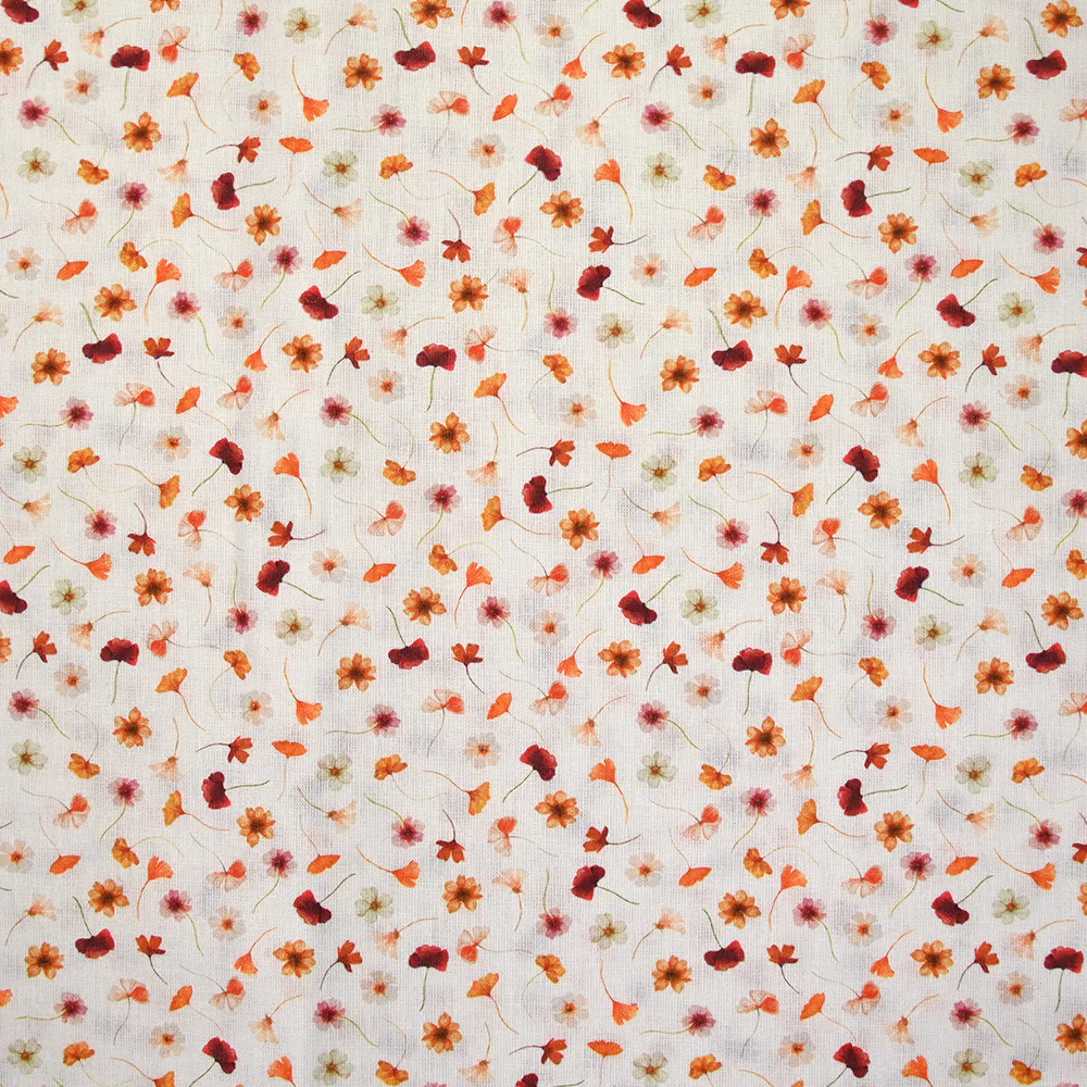 Coton imprimé au gré du vent orange fond blanc