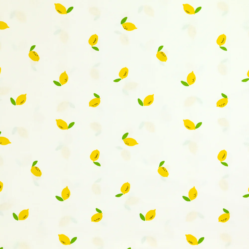 Coton imprimé citron jaune fond blanc