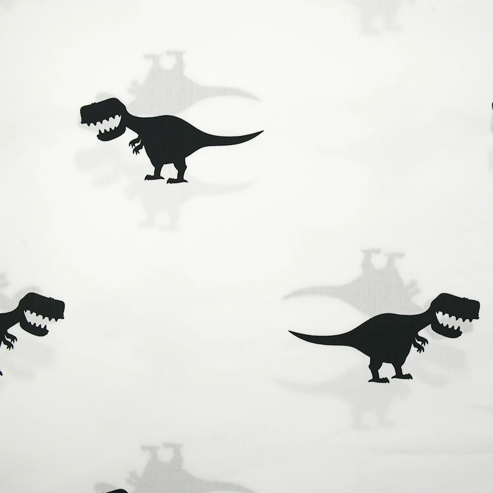 Coton imprimé dinosaure noir fond blanc