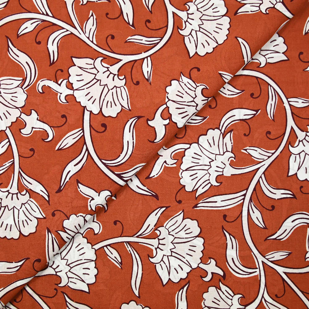 Coton indien imprimé Deepti fleurs blanches fond rouille
