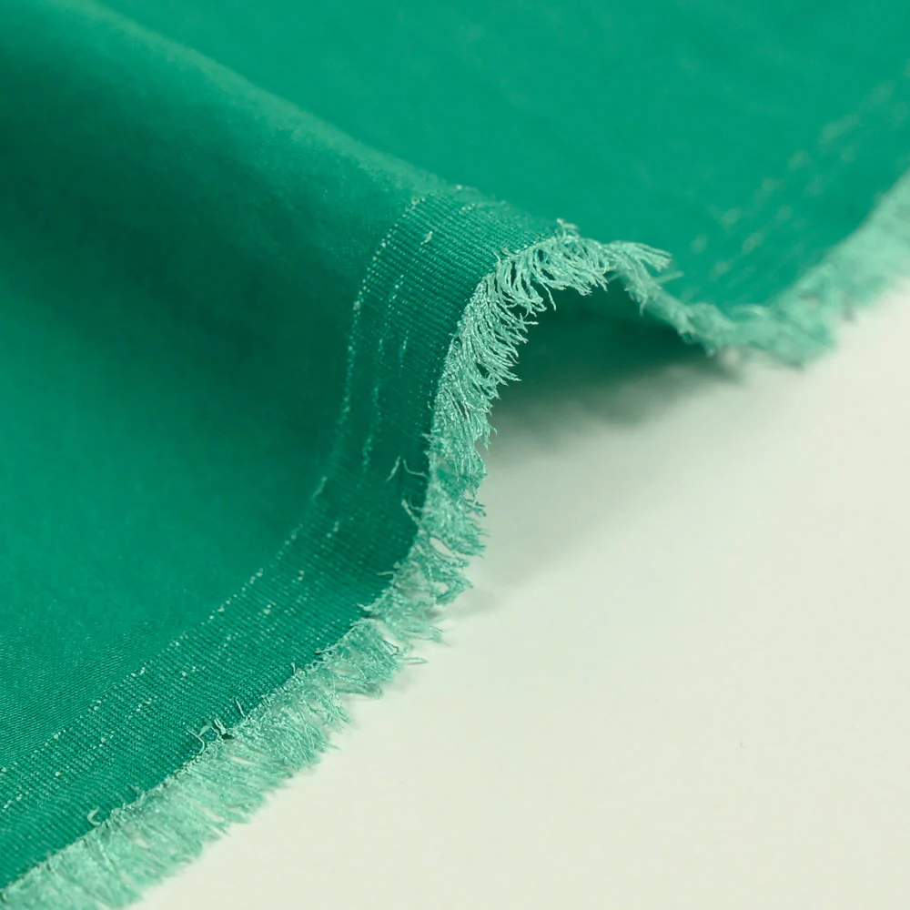 Crêpe satiné de polyester vert - Image 4