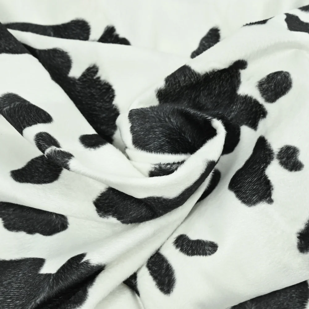 Fausse fourrure poils mi-longs vache noir - Image 2