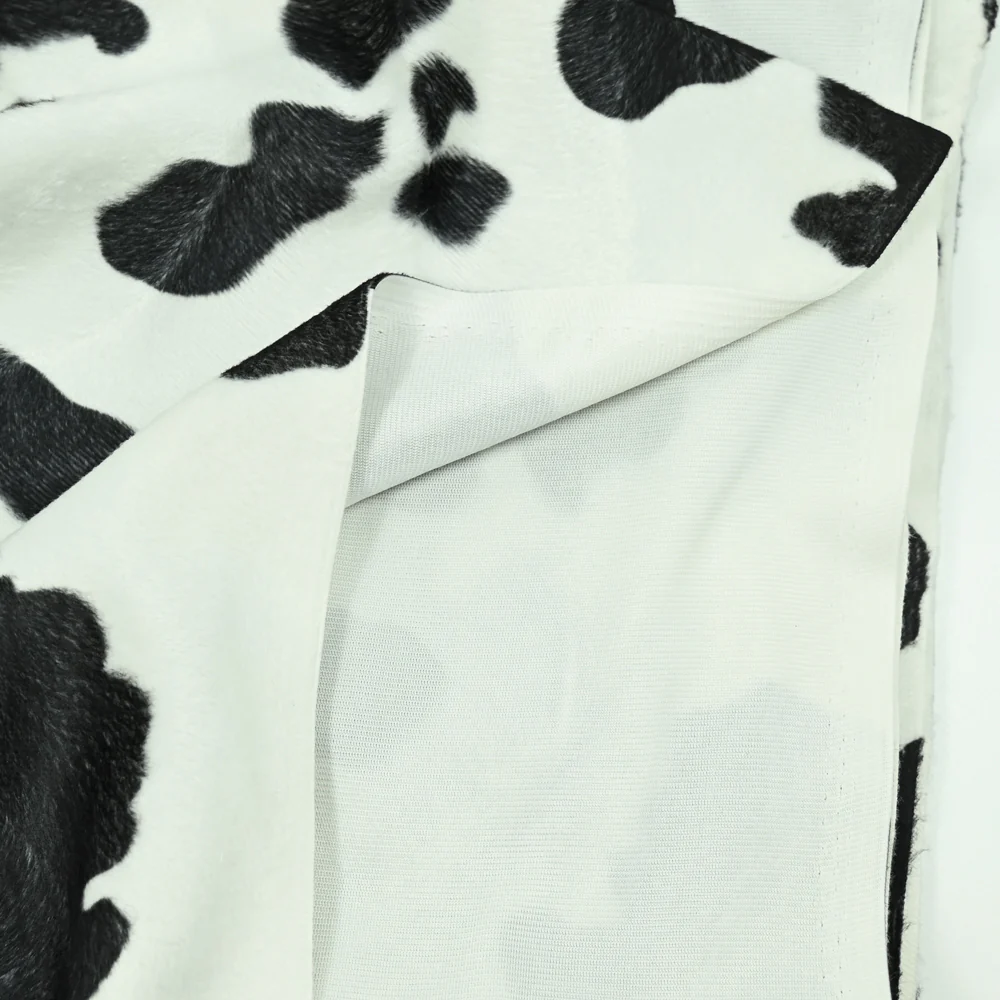 Fausse fourrure poils mi-longs vache noir - Image 3