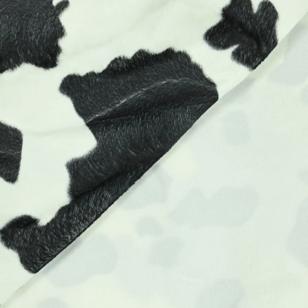Fausse fourrure poils mi-longs vache noir - Image 4