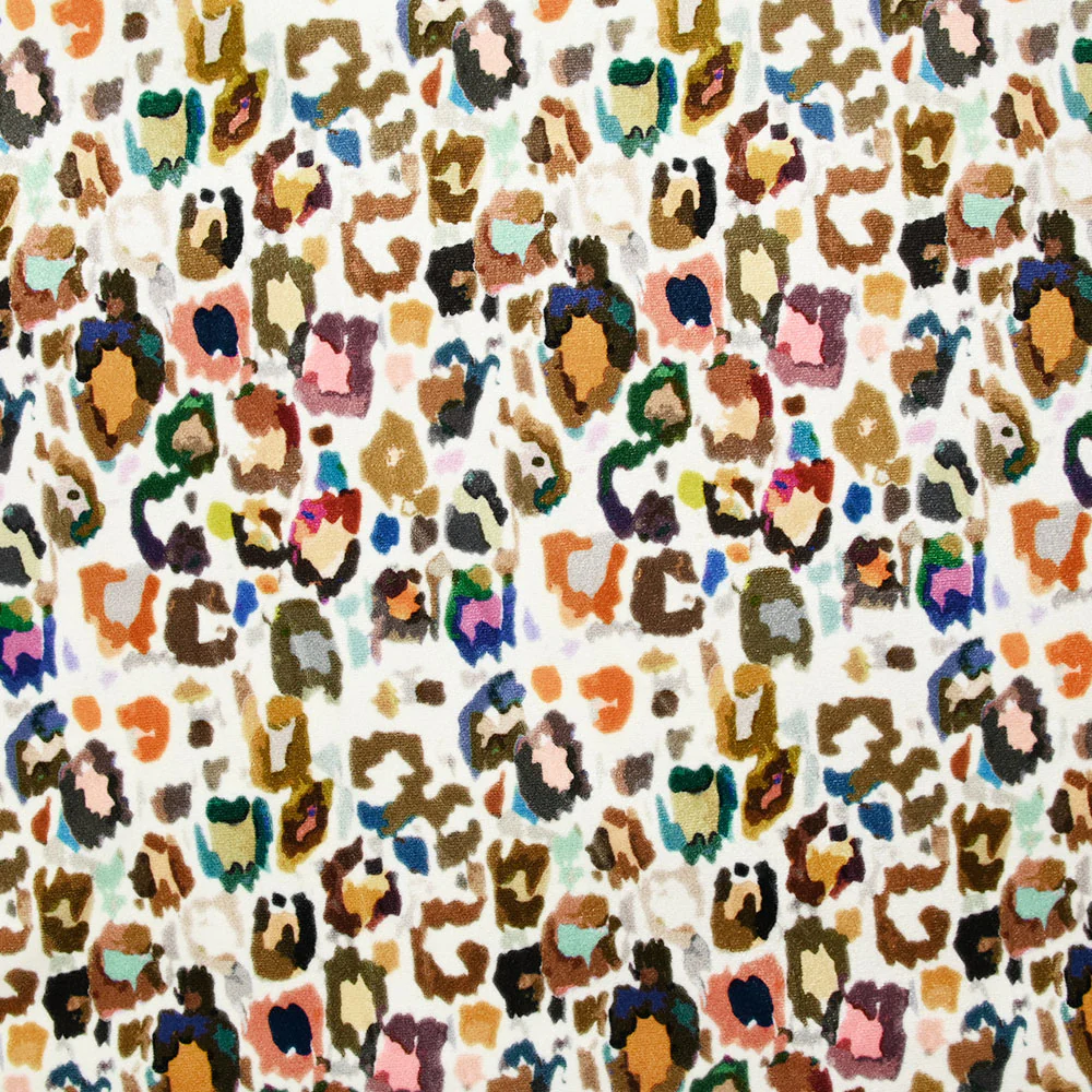 Jersey de velours ras imprimé léopard multicolore fond blanc