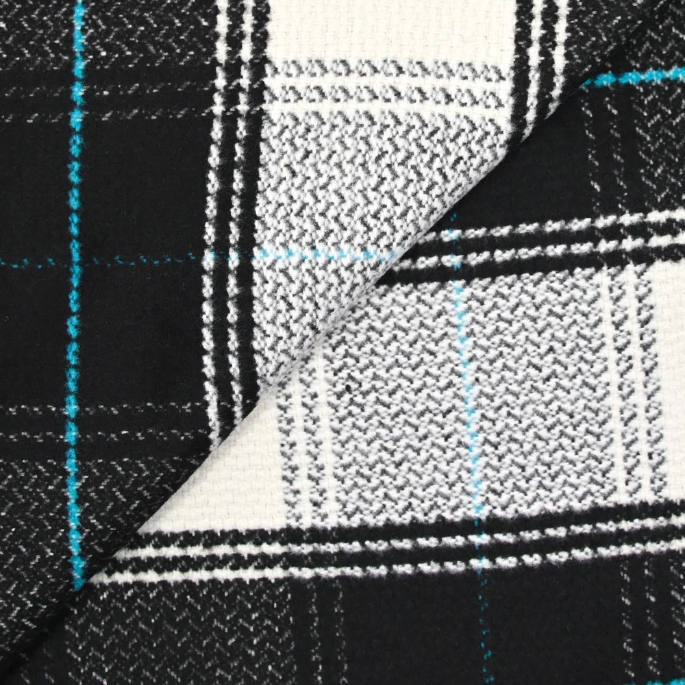 Lainage polyester à carreaux noir ligne turquoise