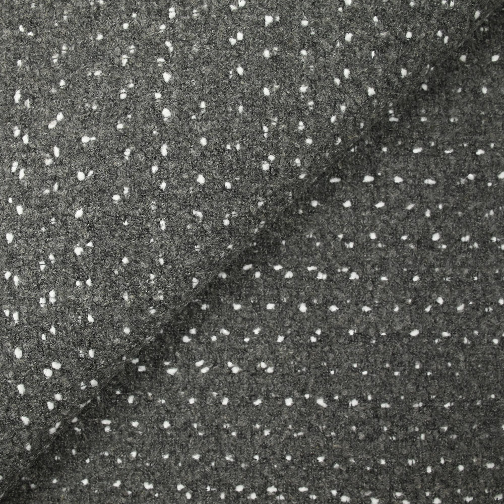 Lainage polyester bouclette et confettis blanc fond gris