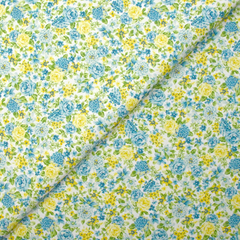 Piqué de coton imprimé les fleurs de Sarah bleu et jaune fond blanc - Image 4