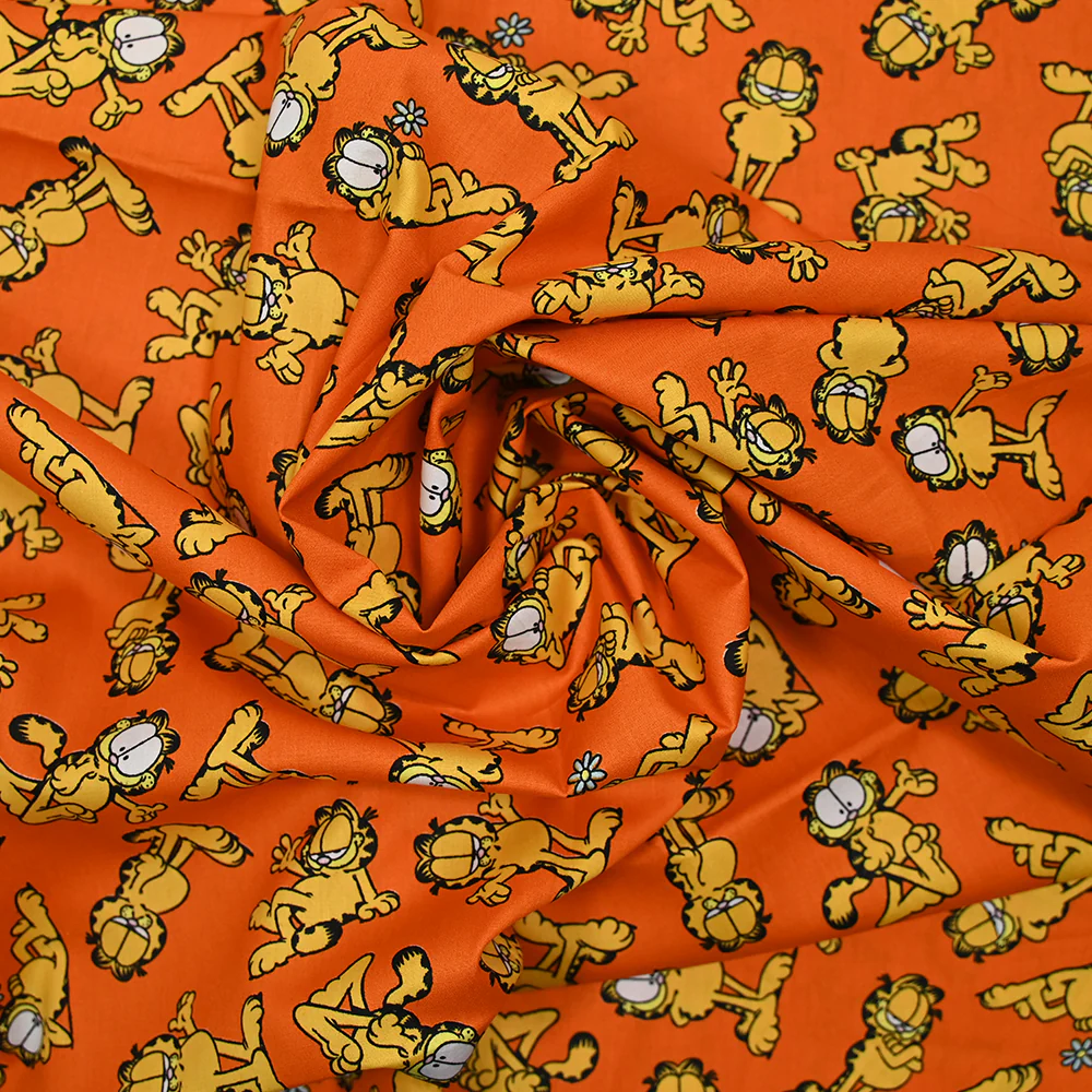 Popeline de coton imprimé Garfield fond orange - Image 2