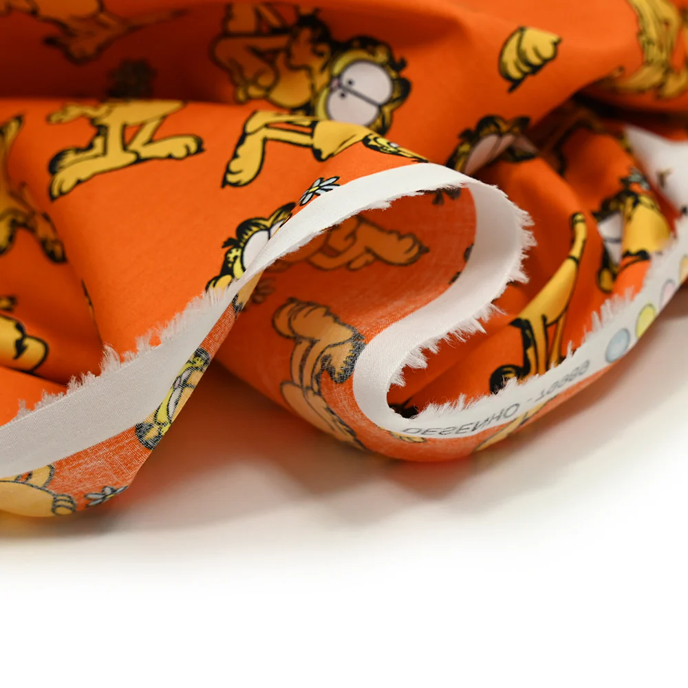 Popeline de coton imprimé Garfield fond orange - Image 4