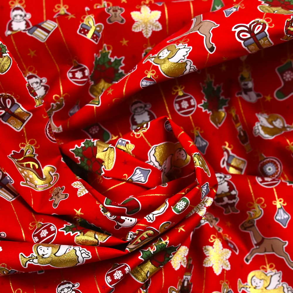 Popeline de coton imprimée esprit de Noël doré fond rouge - Image 2