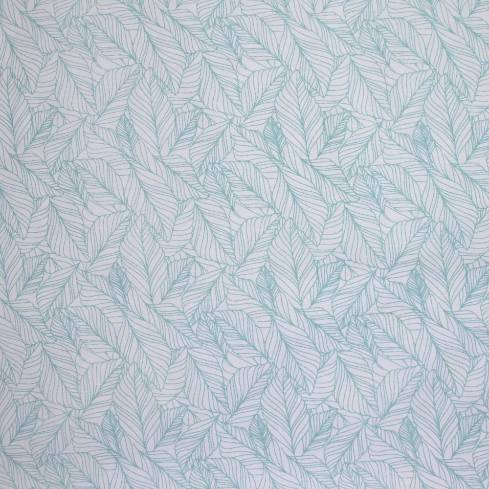Popeline polycoton imprimée feuillages vert fond blanc