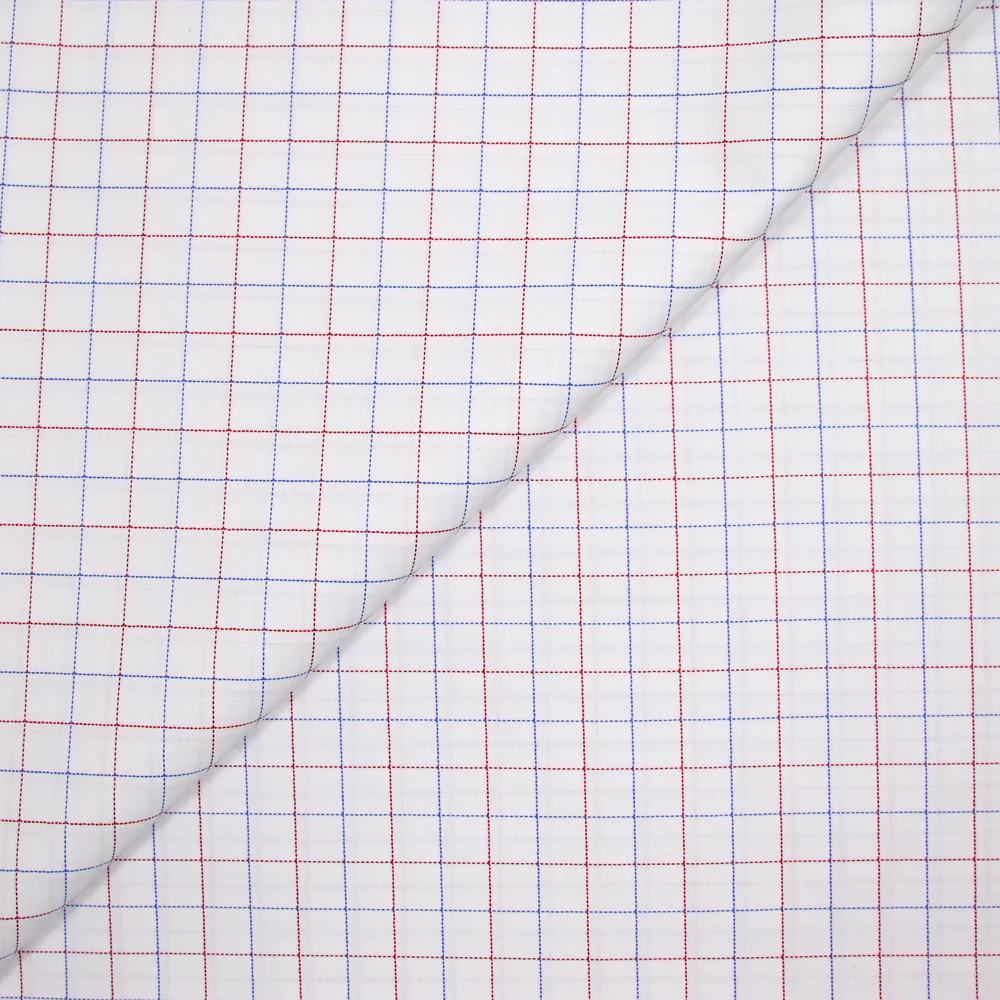 Popeline polycoton tissée-teinte pointillé rouge et bleu fond blanc