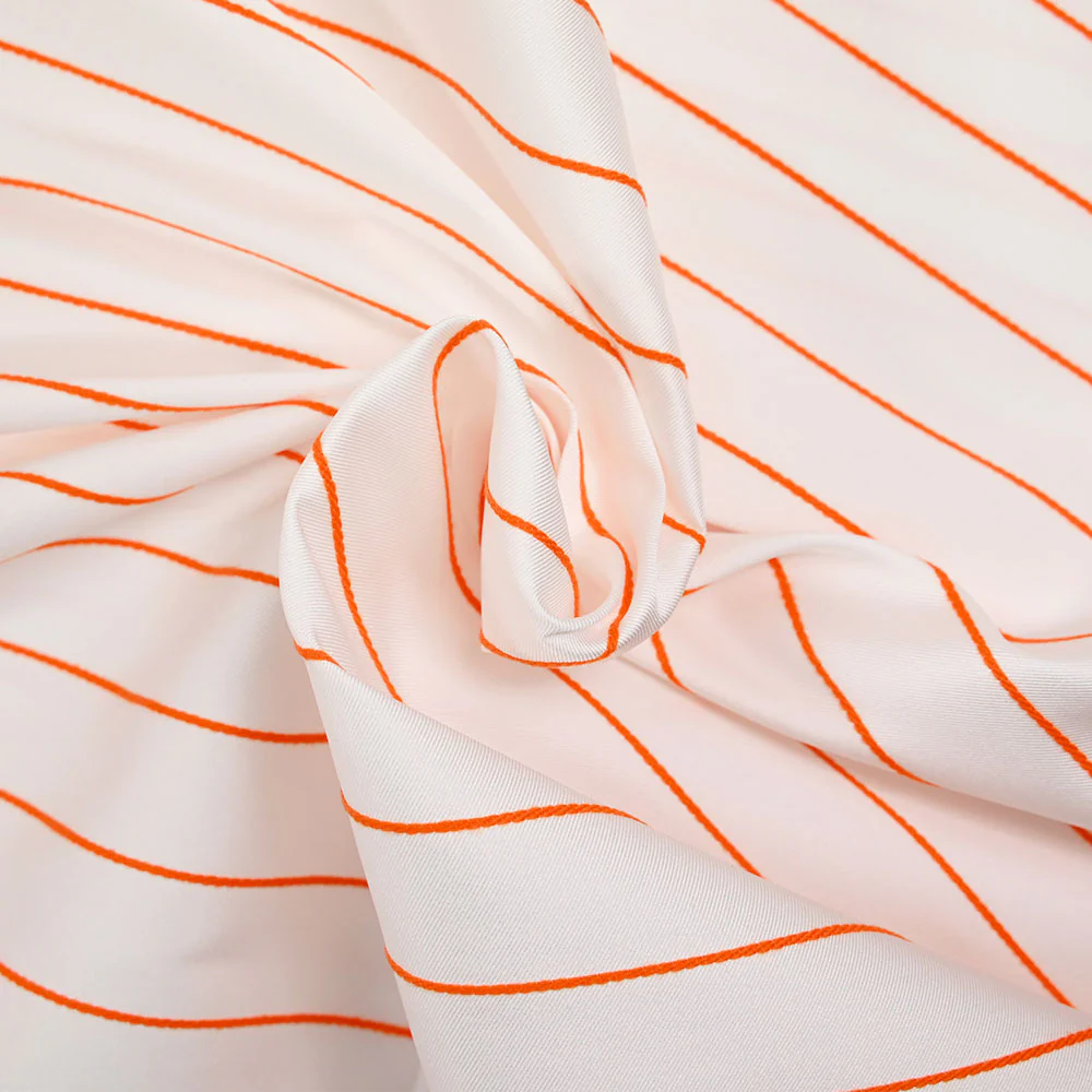 Sergé de polyester rayures brodées orange fond blanc - Image 2