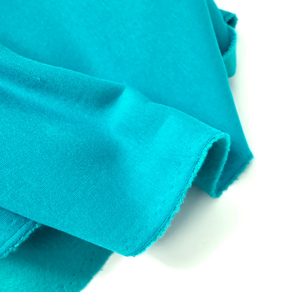 Tissu sweat minkee épais turquoise - Image 3
