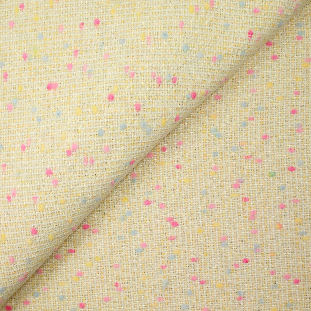 Tweed de laine mélangée confettis rose et bleu fond jaune