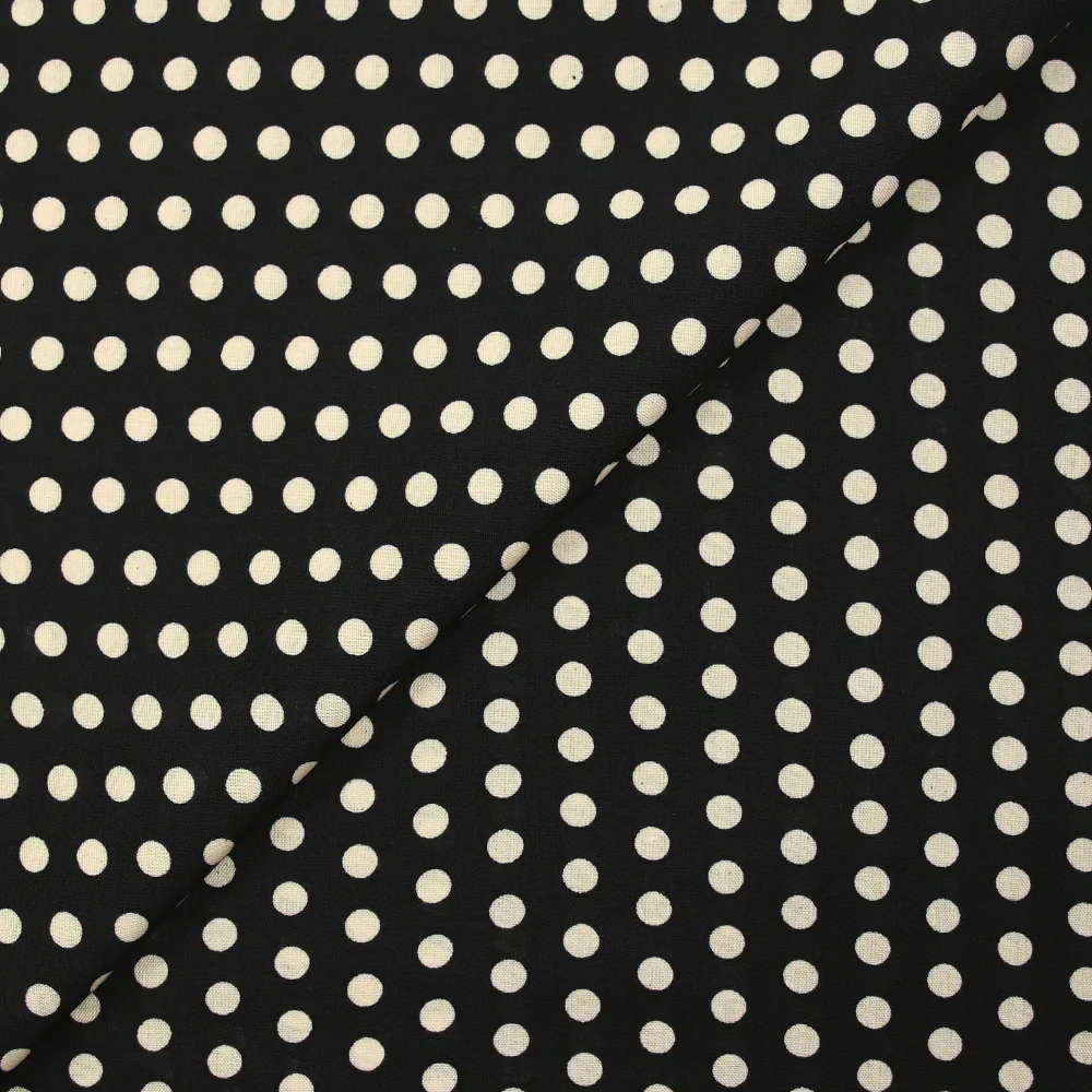 Viscose imprimée à pois 8mm écru fond noir