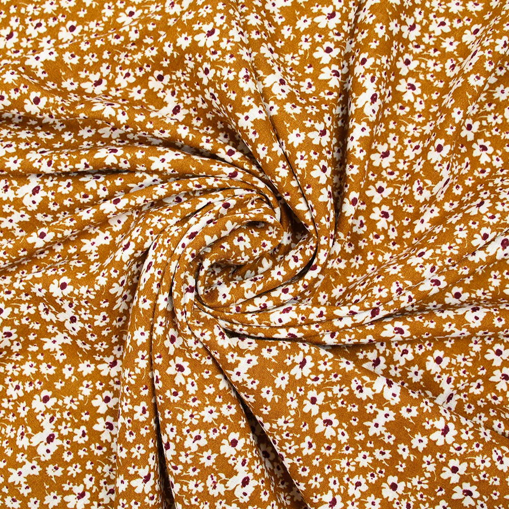 Viscose imprimée fleurs blanches et bordeaux fond ocre - Image 2
