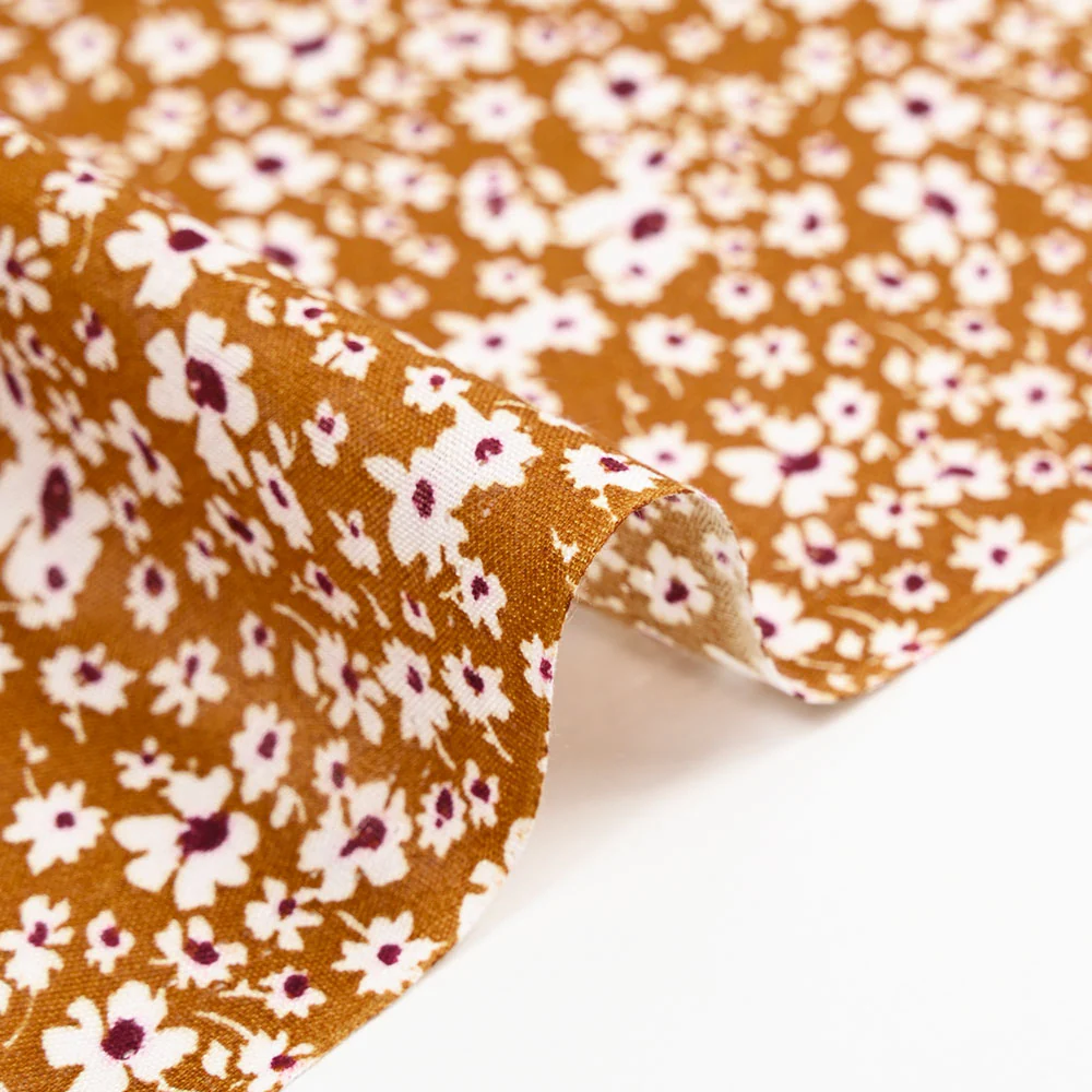 Viscose imprimée fleurs blanches et bordeaux fond ocre - Image 6